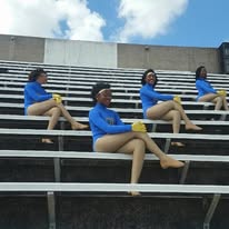 Cheerleaders on bleachers