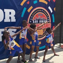 Track athletes with medals and flags